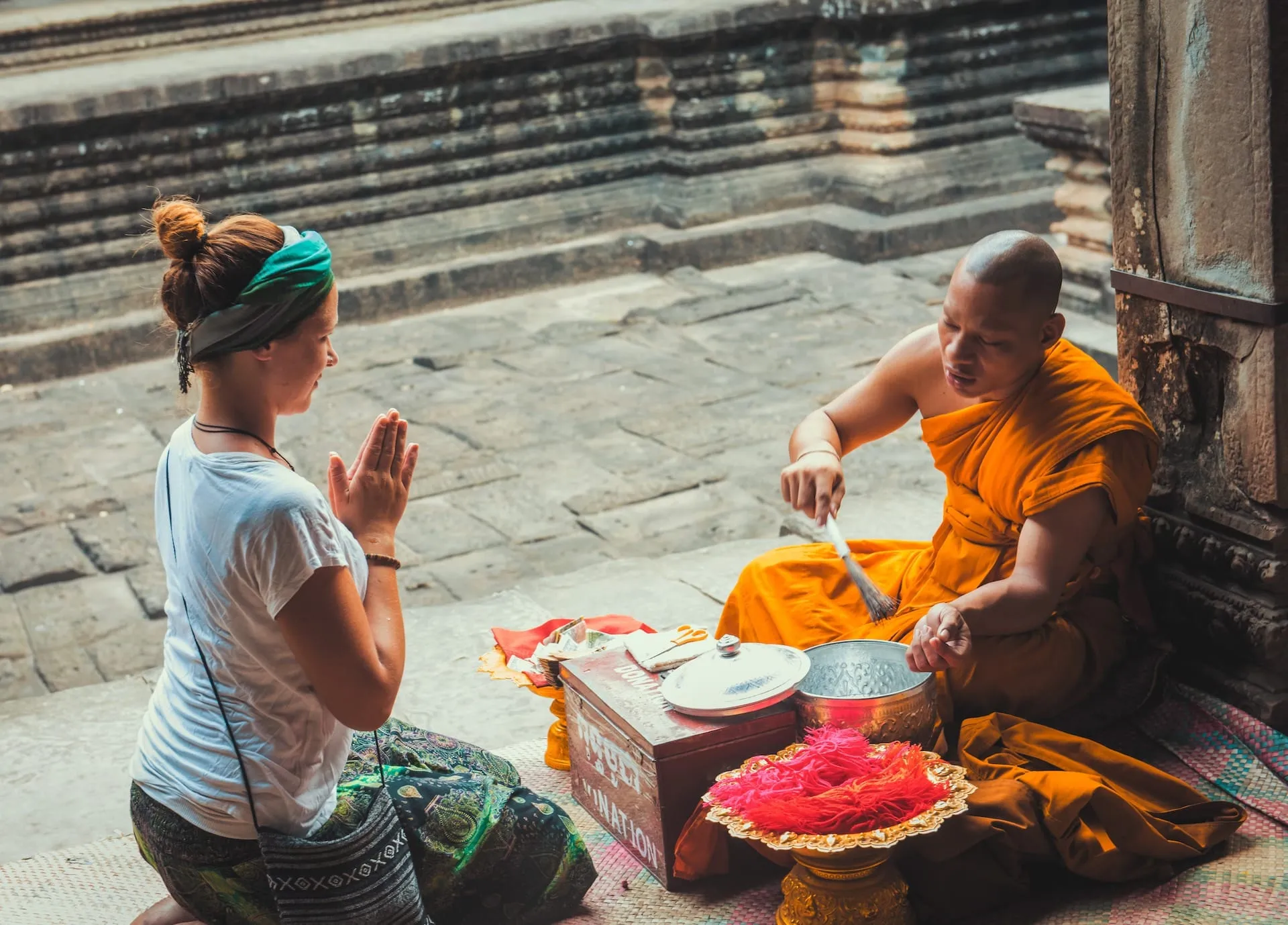 monk-blessing-angkor-wat