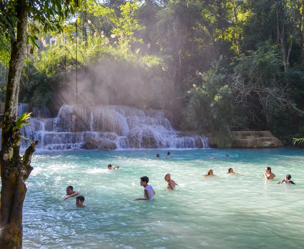 swim-in-the-turquoise-waters-of-kuang-si-falls swim-in-the-turquoise-waters-of-kuang-si-falls
